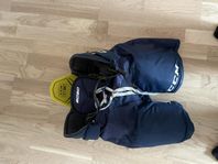 Hockeyskydd CCM byxor marinblå JR M
