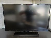 Skantic TV med fotstativ och fjärrkontroll