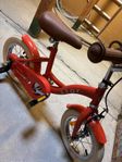 Barncykel 12" med stödhjul.