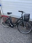 Treväxlad damcykel