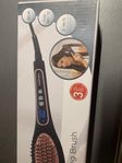 Hair straightening brush