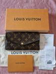 Louis Vuitton .