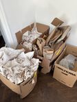 Packpapper för flyttkartonger / flyttlådor bortskänkes 