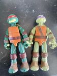 Två Teenage mutant ninja turtles 