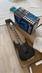 Elgitarr med förstärkare 