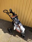 Golfbag, golfvagn och golfklubbor