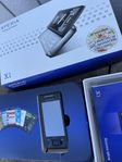 Sony Ericsson mobiltelefon X1 med kartong mm