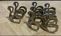 SERVETTRINGAR, 8 st, svanar, metall, nutida