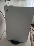 PlayStation 5 disc och trådlösa hörlurar