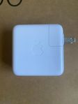 Apple strömadapter för amerikanska uttag.
