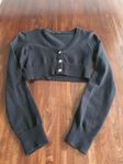 Svart Bolero med blingblingknappar strl146-152nyskick 150kr