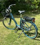 Elcykel Crescent Elora 7-vxl med mittmotor