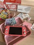 Nintendo Switch rosa med tre spel, två oöppnad