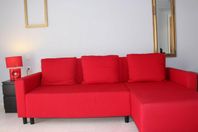 Bäddsoffa med schäslong – röd