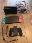 Nintendo switch oled med tillbehör.