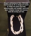Elegant pärlhalsband från 1950-talet. Halsbandet är 48 cm