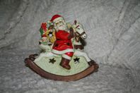 Tomte på gunghäst ljuslykta figurin porslin prydnad jul