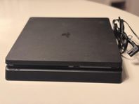  PS4 med 2 handkontroller, stick-controllers och 11 spel