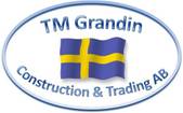 T M Grandin construction & trading AB logotyp